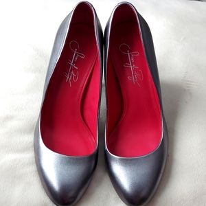Grey faily used pumps
